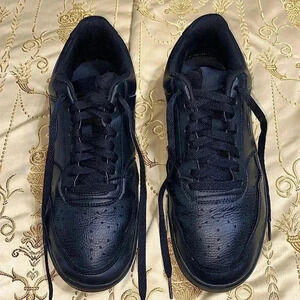 Nike’s Triple Black Court Vision Lo Sneakers